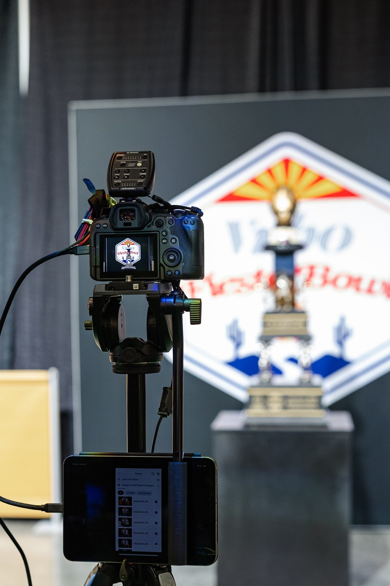 Camera and instant photo delivery system used for the College Football Playoff trophy activation