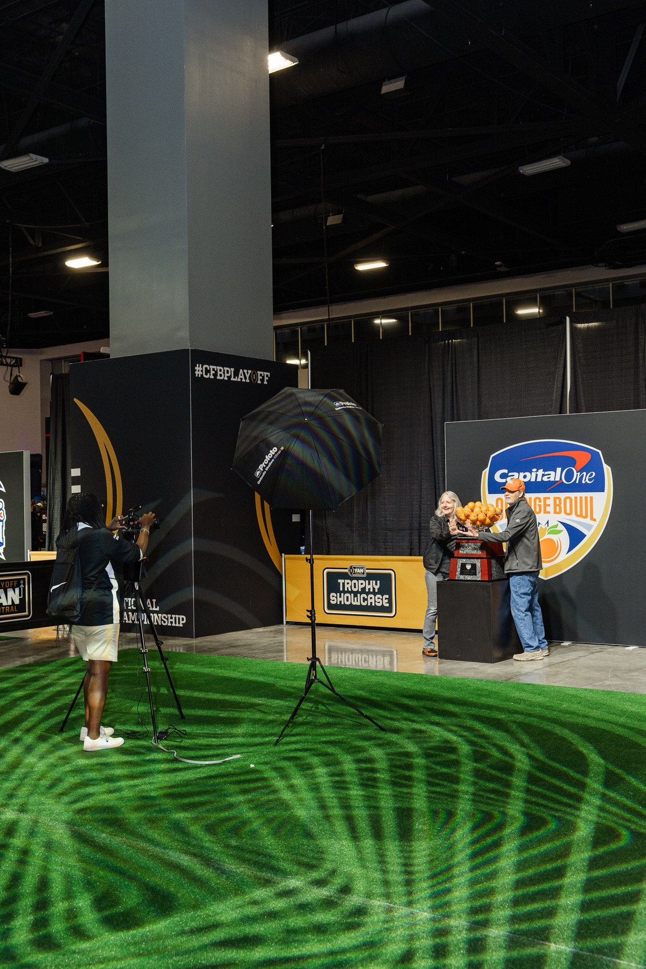 Professional photography station at the Orange Bowl Trophy Showcase