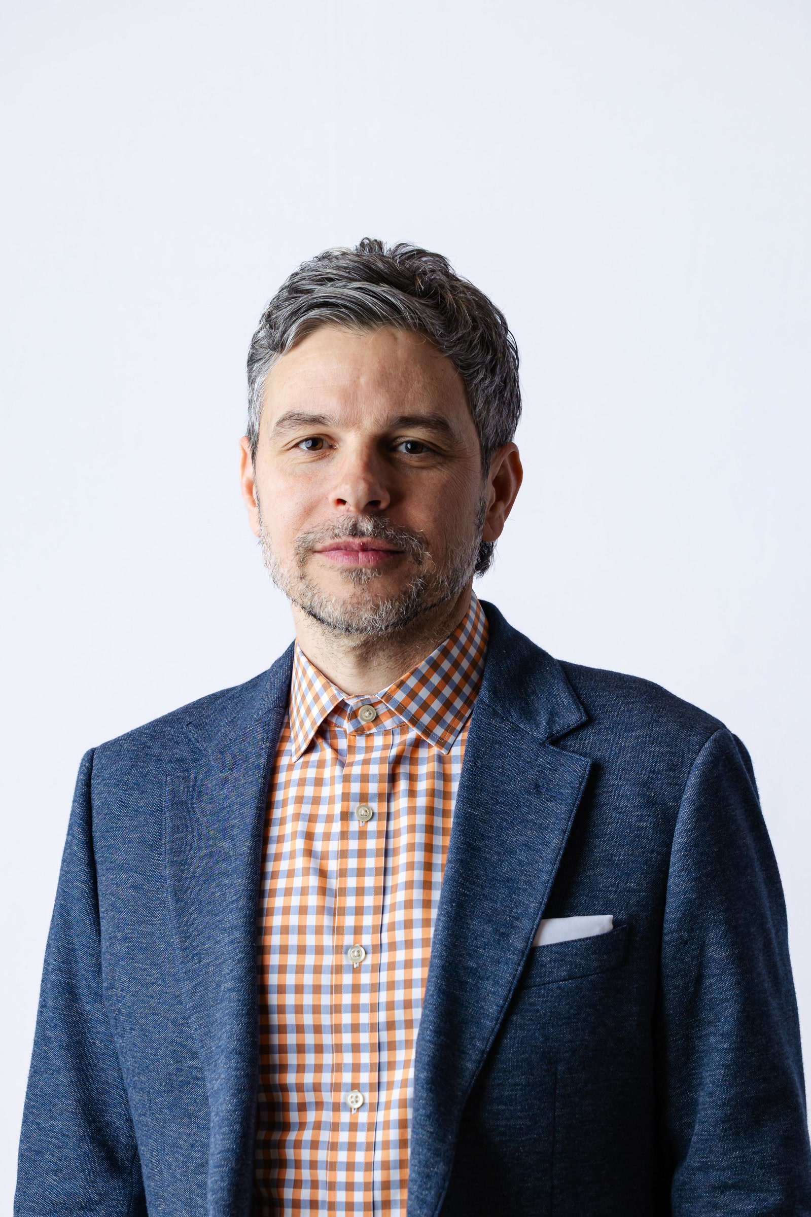 Corporate executive headshot photographed by Bela Foto