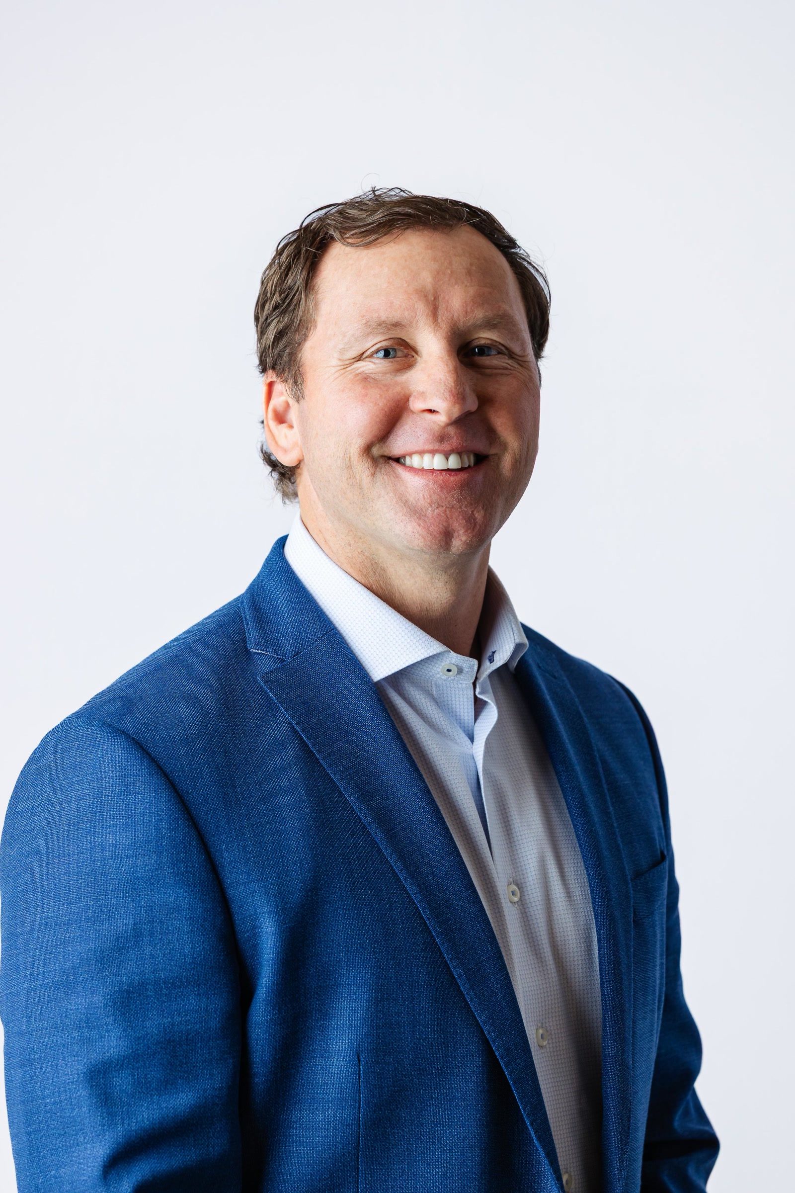 Professional corporate headshot photographed on location