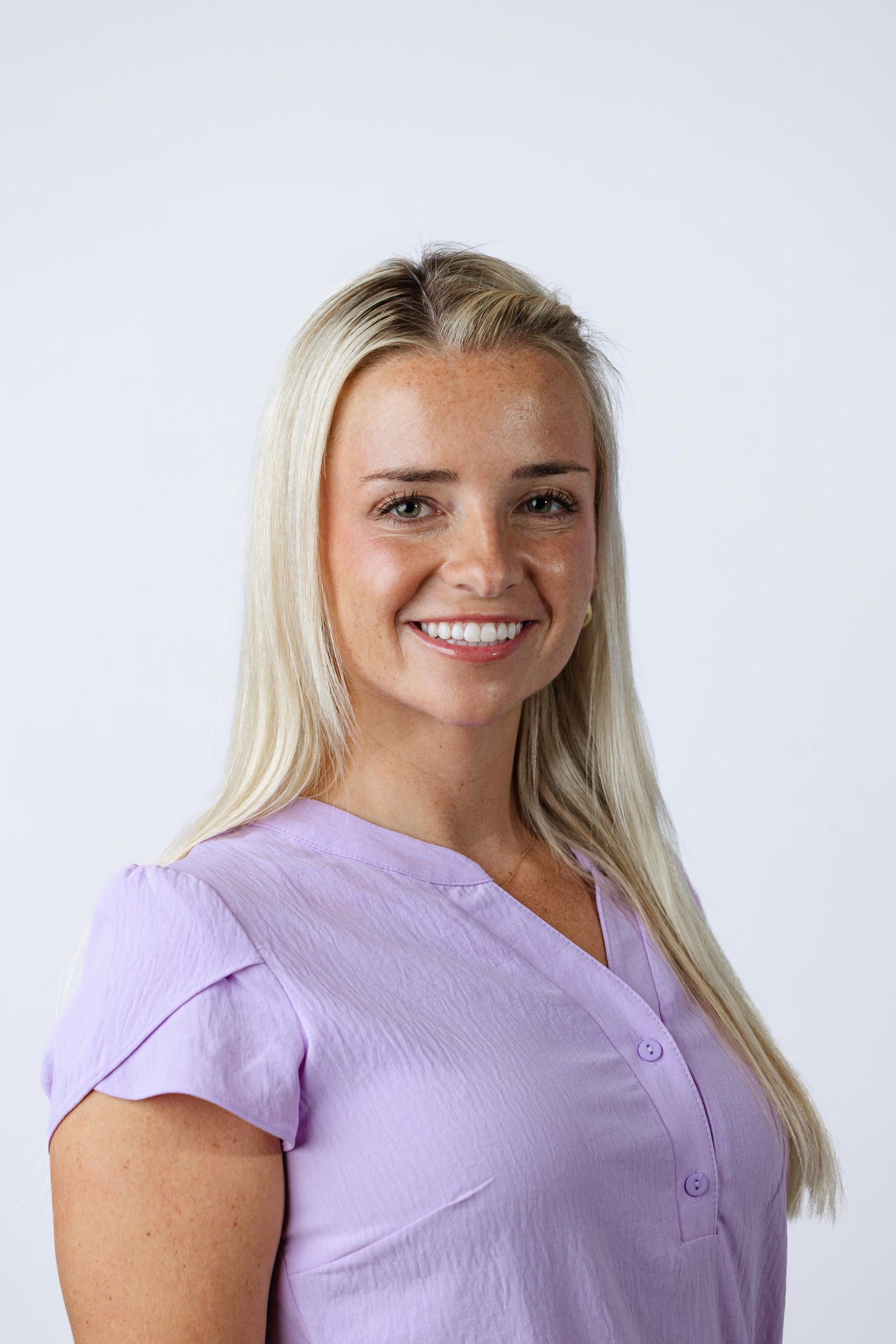 Professional employee headshot photographed on site