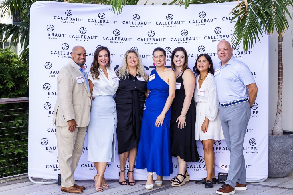 Callebaut team and guests posing for a group photo at a corporate event in Miami