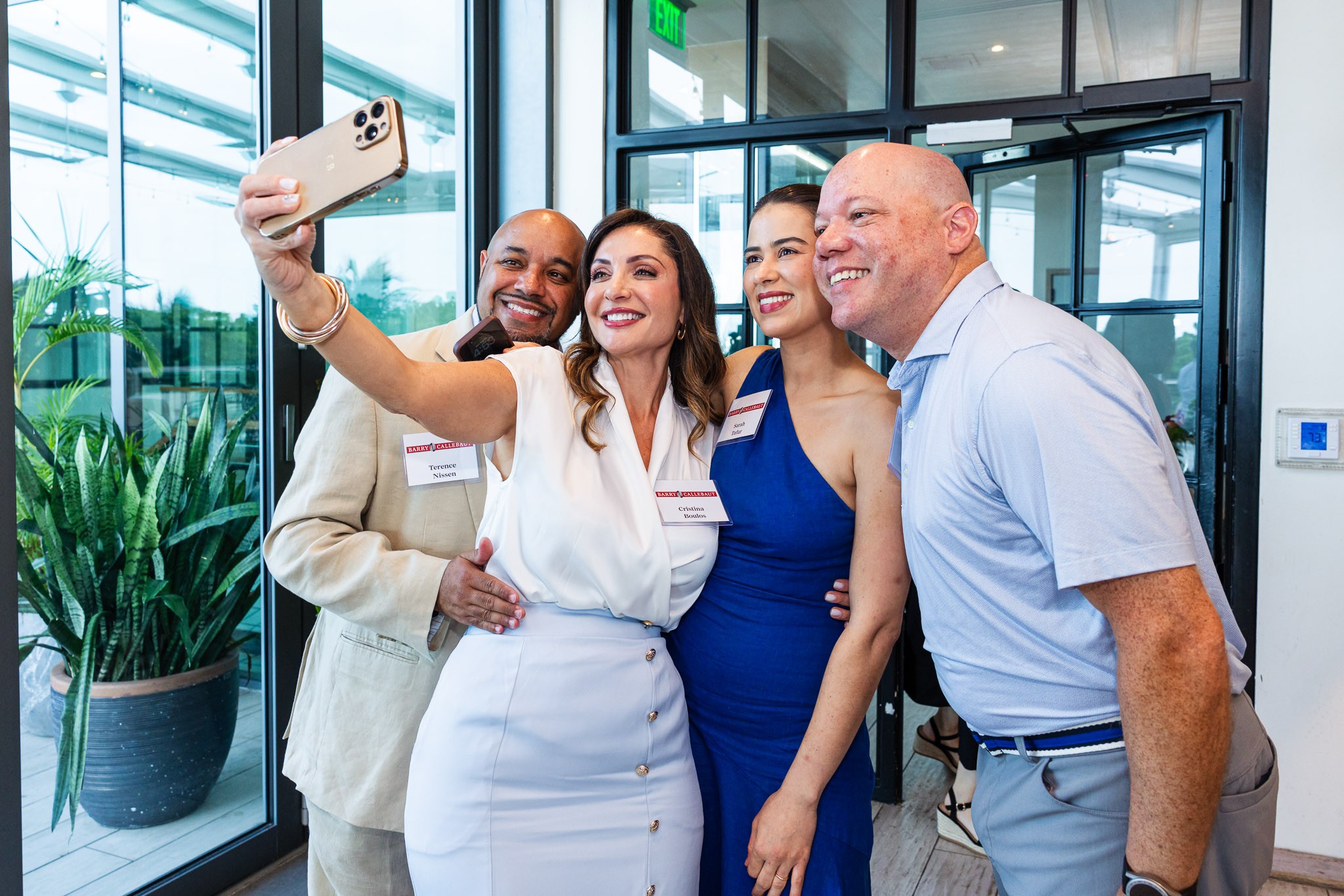 Callebaut team members taking a group selfie during the Masters of Taste event in Miami at Amara at Paraiso