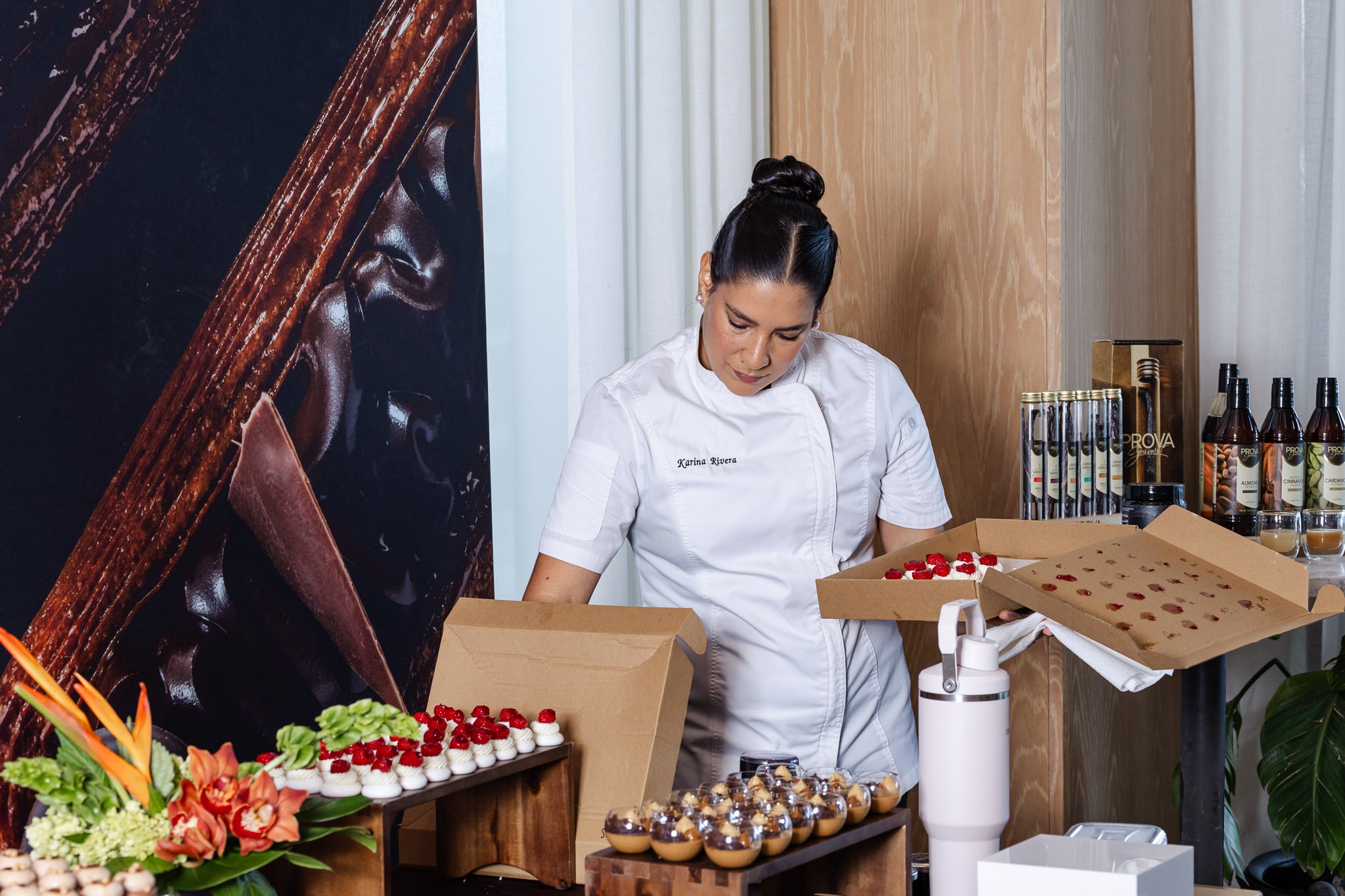 Chef Karina Rivera preparing desserts for a Callebaut culinary presentation